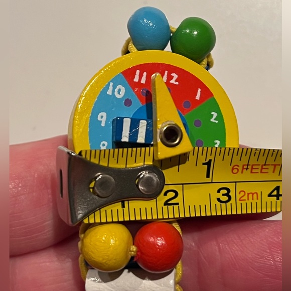 Elastic wooden tatiri watch for kids.  Helps teach kids how to read time. - Picture 7 of 8